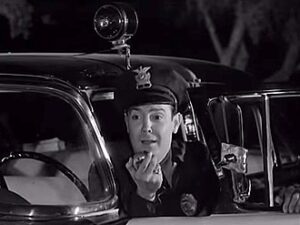 Paul Marco as Patrolman Paul Kelton in Night of the Ghouls.