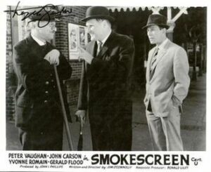 Smokescreen lobby card autographed by Deryck Guyler.