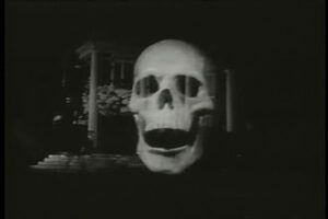 Shot of the attacking skull from the 1958 film The Screaming Skull.