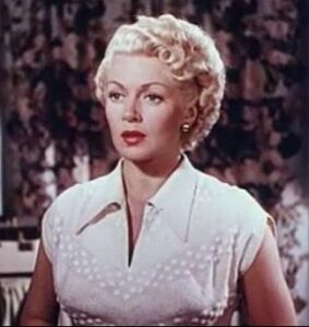 Lana Turner as Fredda Barlo.